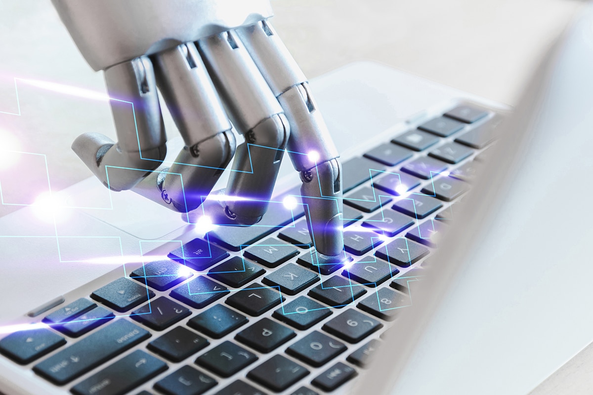 Innovation technology robot hands and fingers point to laptop button advisor chatbot robotic artificial intelligence concept